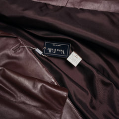 Cappotto in pelle con collo di pelliccia